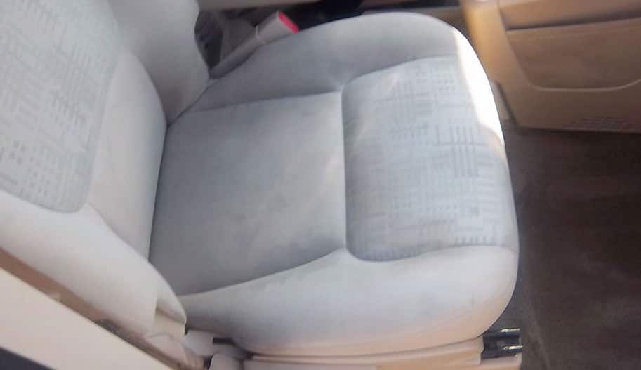 Water damage removal on car seat upholstery